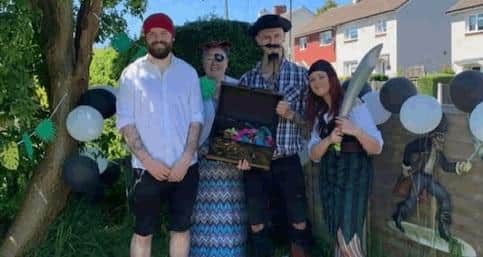 Connor Greaves, Kelly Flowers, James Jenkinson, Billie Jenkinson dressed as pirates for the treasure hunt in aid of Weston Park Hospital.