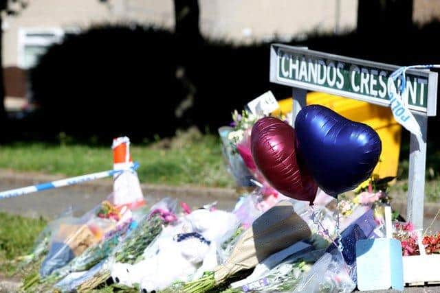 Floral tributes at the crime scene at Chandos Crescent, Killamarsh.