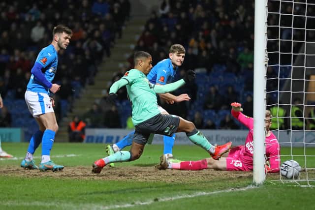Laurence Maguire scored twice as the Spireites staged a comeback against Notts County.