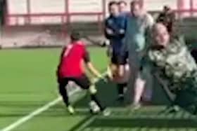 Lewis Gough, 28, slid over on the fallen advertising board after letting the ball go out of play