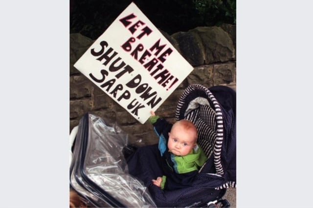 A young supporter with a placard joins the campaign