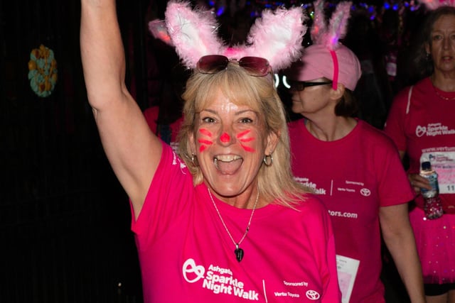 This walker painted whiskers on her cheeks and gave herself a pink nose, topping the look with the event's trademark bunny ears.