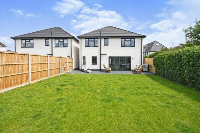 As you can see, the house is as attractive from the back as it is from the front. A large lawn is low maintenance and enclosed by secure fencing or a hedged boundary.