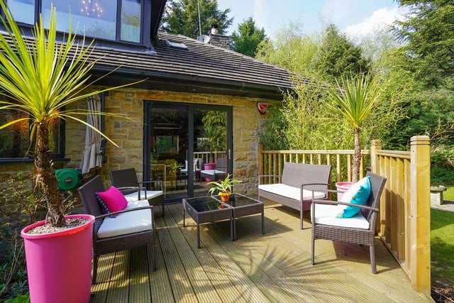 There's plenty of space to unwind in on a pleasant summer's day, including a decked area and lawns with pathways running between them.