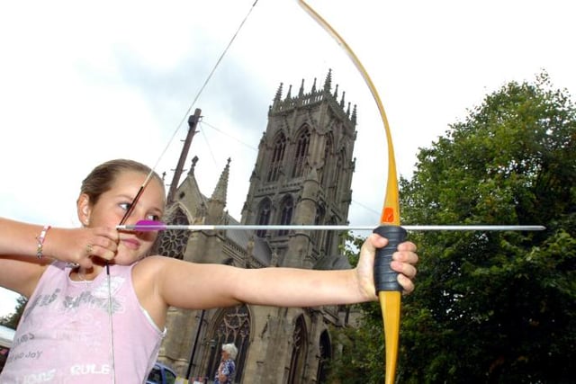 Lauren Barker aged 11 tries her hand at archery at the Autum Minster Fayre 2007.