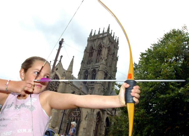 Lauren Barker aged 11 tries her hand at archery at the Autum Minster Fayre 2007.