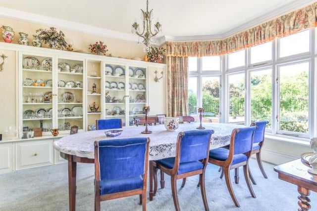 The dining room provides a space for entertaining and fine meals.