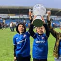 Youngsters raise the cup in this photo from Daniel Revell