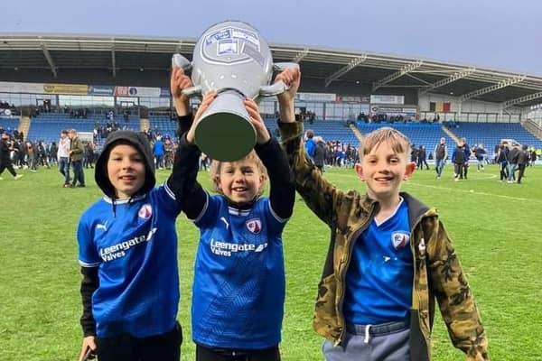 Youngsters raise the cup in this photo from Daniel Revell