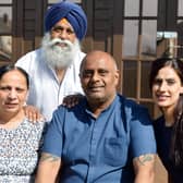 Post Office man Harjinder Butoy was wrongly accused of stealing thousands but his name has now been cleared. Seen with his family mum Satya Devi, Dad Kesar Singh, and wife Balbinder Butoy.