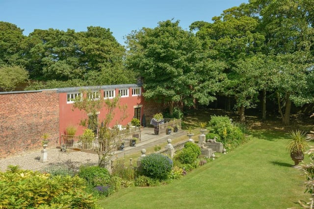 The property has a detached garden house set within the walled garden that could be used as a 4th bedroom. Stunning garden views are a plus.