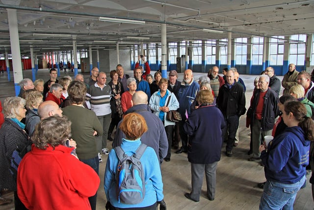 World heritage site discovery days, in Belper. Guide Mary Smedley giving a tour at the East Mill.