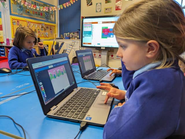 Children learning digital skills in Derbyshire school