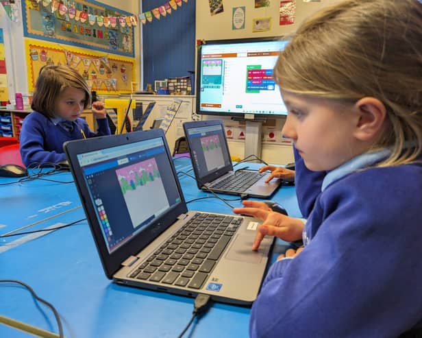 Children learning digital skills in Derbyshire school