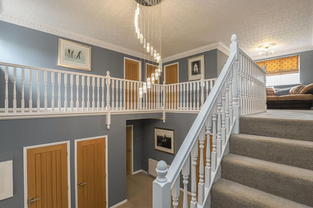 Four of the five bedrooms are accessed from the galleried landing where an impressive staircase rises from the ground floor.