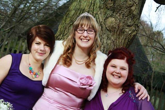 Charlotte with her two best friends Jenny (left) and Sarah (right) on her wedding day.