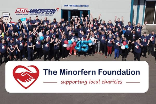 The Minorfern Foundation logo and employees celebrating the SDL Minorfern 45-year anniversary