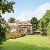 The main garden is set within a brick walled and tree lined boundary, is mainly laid to lawn, with established shrubbed borders, walkways and a flagged stone patio.