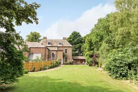 The main garden is set within a brick walled and tree lined boundary, is mainly laid to lawn, with established shrubbed borders, walkways and a flagged stone patio.