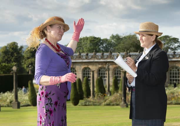 Kate Stuart (the mischievous stately home tour guide) rehearses in the surroundings of Chatsworth with Helen Rogers (her partner in crime).