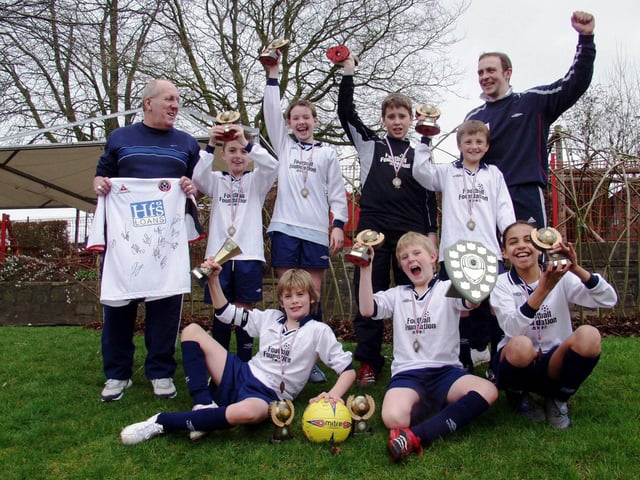 Dronfield Junior School sports teacher Jonathon Clark with his mixed Y5/6 football team in 2006. Back row l to r Andy Chambers, John Godfrey, Nicola Emery, Oliver Grocutt, Jake Crookes, Manager Jonathon Clark Front row Lewis Derrett (captain), Danny Nicols and Naomi Smith