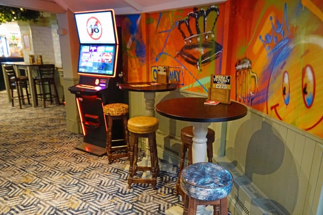 The pub has been brightened up with much lighter pastel colours used throughout, complemented by fabrics, patterns and on-trend foliage. There is also graffiti that incorporates features from the magnificent history of the market town.