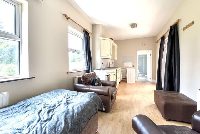 Ideal for a dependent relative  or  overnight visitor, the apartment has an open-plan kitchen and lounge and a separate bedroom with en-suite bathroom.