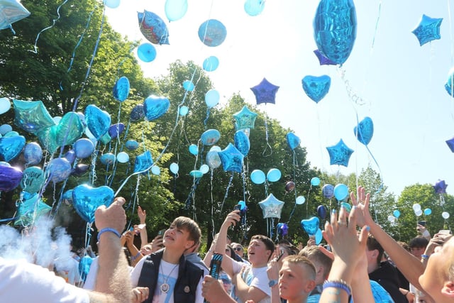 On a beautiful sunny day, friends and family came together to release balloons and remember their hero Logan.