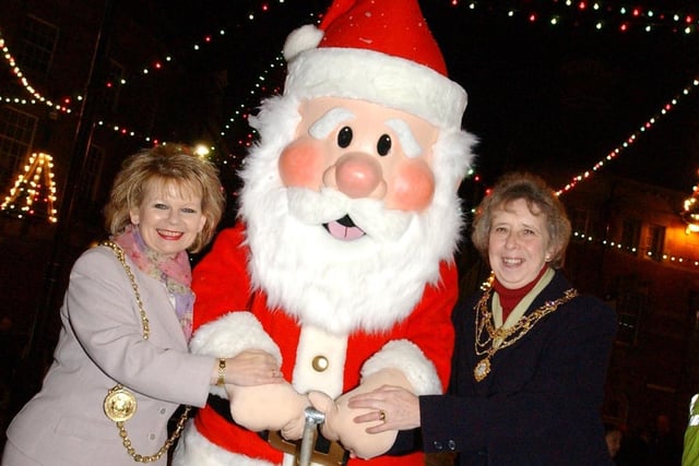 A hug for Father Christmas at the 2003 event.