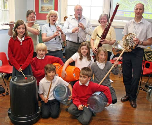 Riddings Junior School pupils are pictured taking place in a special science week, playing music with members of Chesterfield Symphony Orchestra.