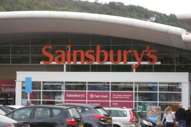 Sainsbury's is urging people to people to wear face coverings, unless exempt, in its stores.