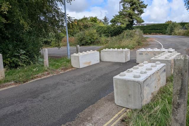 Giant “Lego” blocks were dumped outside her home.