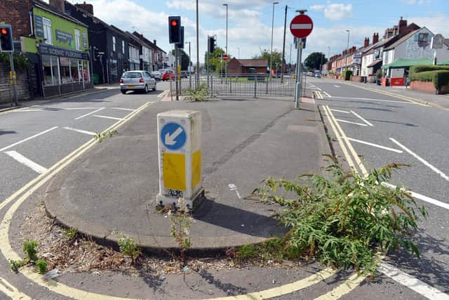 Weeds growing on Chatsworth Road in Chesterfield.