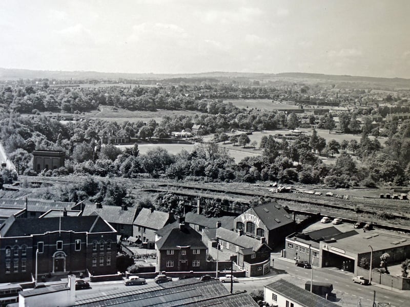 Queen's Park was officially opened to the public on 2 August 1893 with the first Chesterfield Floral and Horticultural Society Show being held in the park. A cricket pitch constructed in 1893-18944 was inaugurated in May 1894, while the associated pavilion was constructed in 1898. Late 19th century park facilities included a bandstand, boating lake, cycle track and gymnasium; plans for public baths were not implemented.
In 1901 a further 13 acres (about 5.5 hectares), separated from the original park by Boythorpe Avenue to the south, was acquired by the town as a memorial to Queen Victoria (d 1901). This land (outside the site here registered) was laid out as a recreation ground known as Queen's Park Annex.
Pictured is a view of a New Beetwell St, Queen's Park, Markham road and Boythorpe area Chesterfield in 1959.