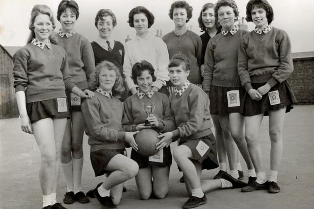 Codnor secondary modern school netball team are Derbyshire County champions, March 1961.