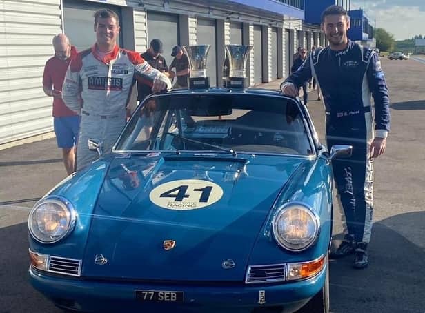Seb Perez and George Gamble with their Porsche and trophies in France.