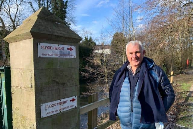 Coun Steve Wain is a flood defence warden in Matlock and says the town must not become known as a 'flood town'.