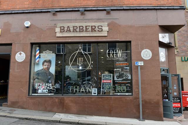 Less Than Zero Barbers is back open.