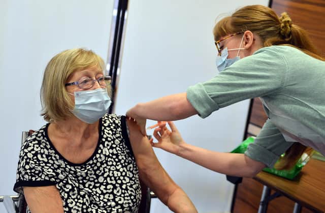 Chesterfield Casa Hotel has been used as a vaccination site during the rollout. Sheila Wood having her jab from vaccinator Lara White.