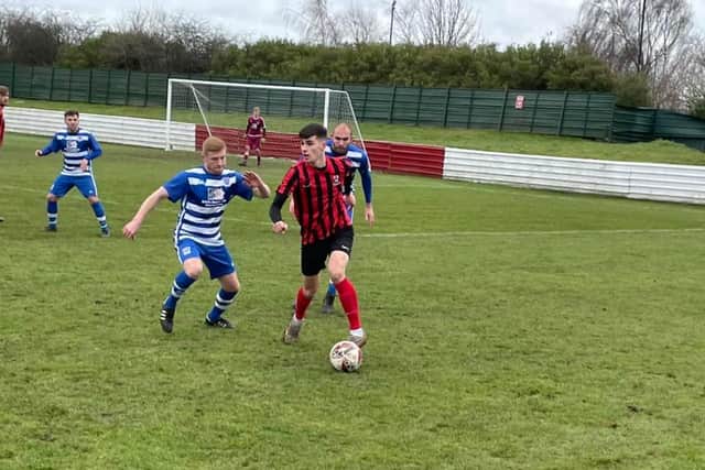 Action from Shirebrook's win over Hall Road.
