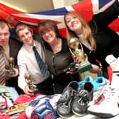 Bolsover School prepare to take sports equipment to Gambia. l-r: Mr John Whittaker, Jamie O Connor, Mrs Jackie Stewart and Anna Carter, in 2009
