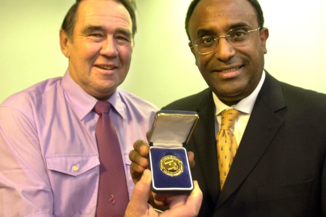 Bryan Edwards, left, received a special medal from Dr Solomon Tesfaye Consultant Physician at the Royal Hallamshire Hospital in 2002. Mr Edwards is Diabetic and has been insulin dependant for 50 years.