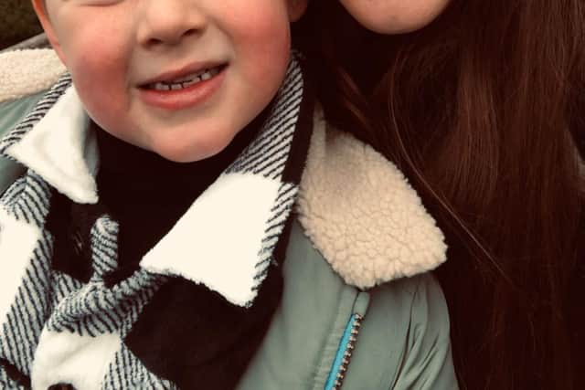 Megan Allfree and her son Theo, 6.