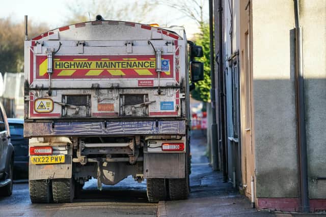 Residents have complained lorries are driving on the pavement inches from their homes to access a building site.