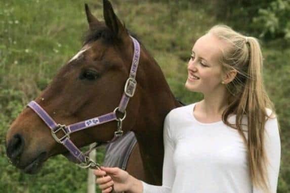 Gracie Spinks with her beloved horse Paddy. Picture kindly submitted by Gracie Spinks' family.