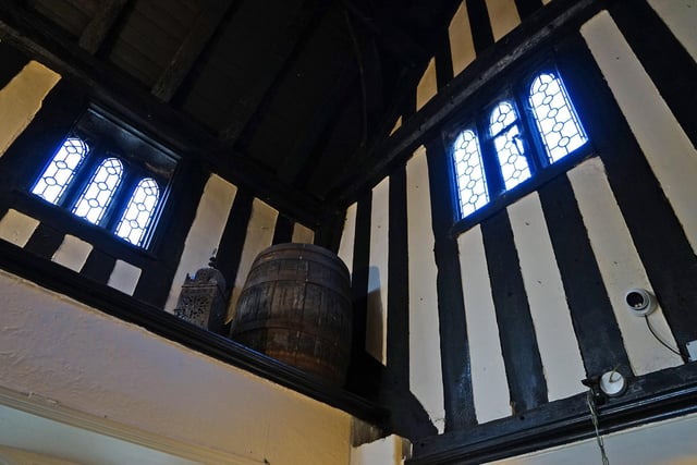 The building has stunning black and white, half-timbered walls