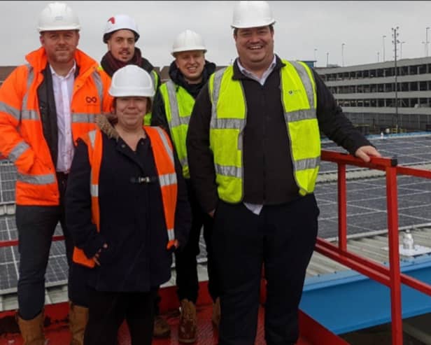 From L-R: Gary Sucharewycz (CEO of Custom Solar), Tony Denney (Site Manager for Custom Solar), Cllr Kimberly Barrett (Cabinet Member for Climate Change and the Green Recovery), Owen Hughes (Project Manager at Portsmouth City Council’s Energy Services Team), Andrew Waggott (Energy Services Team Manager at Portsmouth City Council).