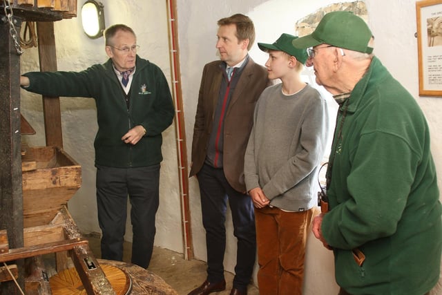 Lord Burlington and his son James are shown around Heage Windmill Roger Hatcher and Alan Gifford