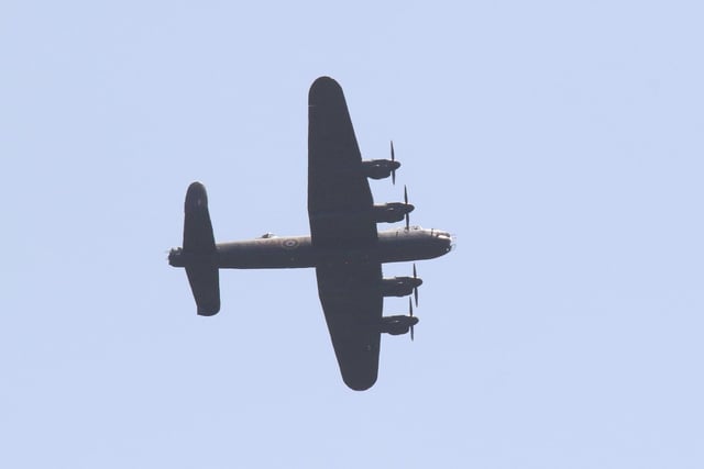 The Lancaster Bomber as it passed close to Doe Lea on Saturday.