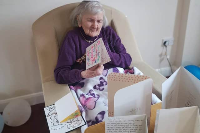 Gladys with some of her cards.